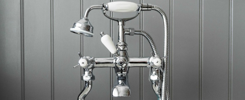 Bathtub faucet with hot and cold indicators in chrome.